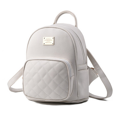 Igapäevane väike naiste seljakott metallist embleemi ja taskuga