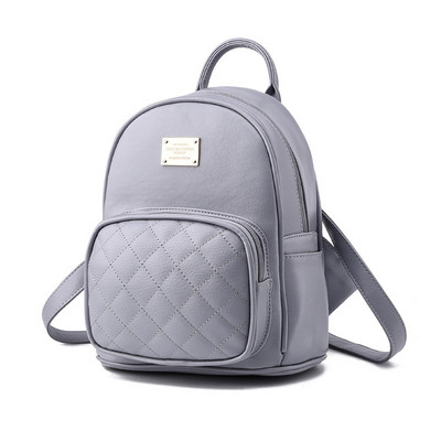 Igapäevane väike naiste seljakott metallist embleemi ja taskuga