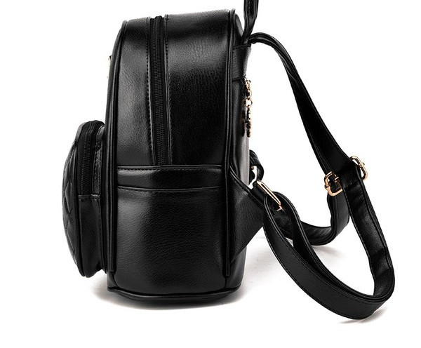 Igapäevane väike naiste seljakott metallist embleemi ja taskuga