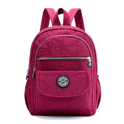 Igapäevane tekstiilist taskutega seljakott - kolme värvi