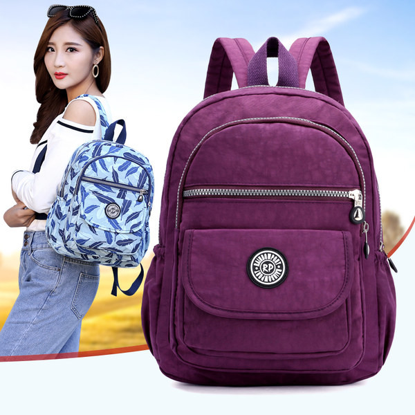 Igapäevane tekstiilist taskutega seljakott - kolme värvi