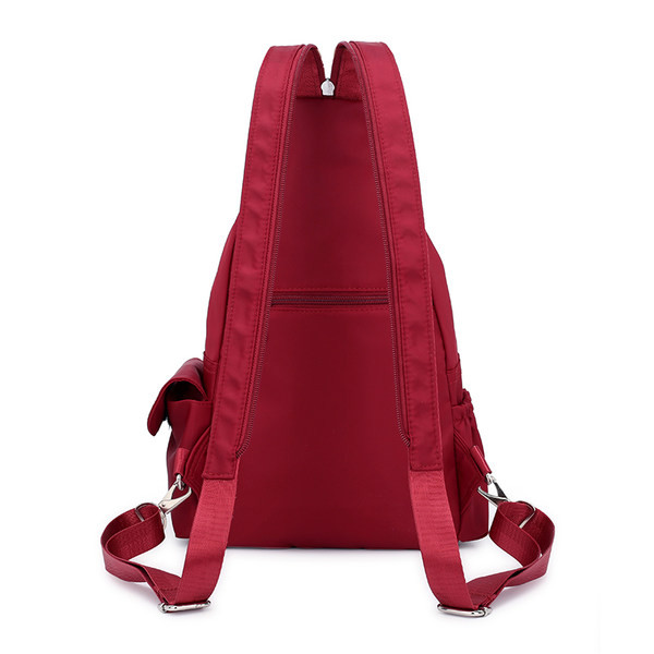 Igapäevane naiste seljakott tekstiilist taskutega