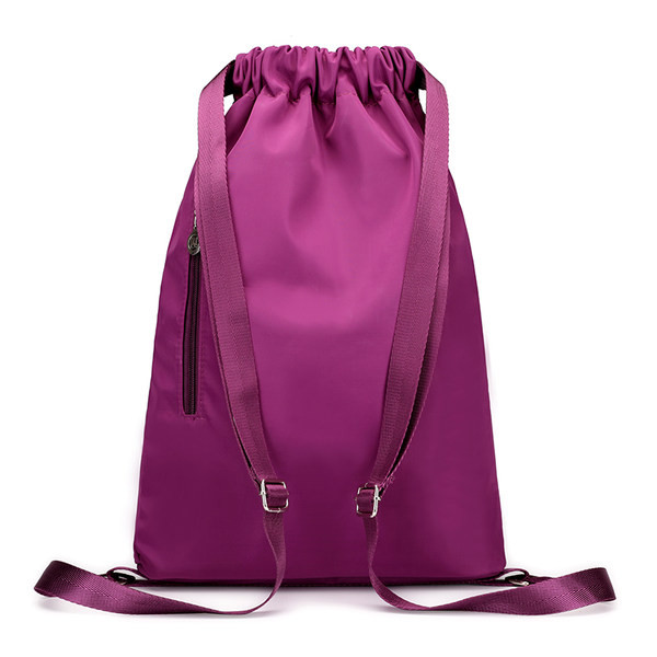 Naiste tekstiilist seljakoti tüüpi kott