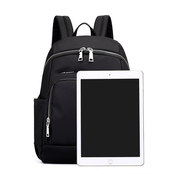 Naiste lõuendist seljakott taskutega mitmes värvitoonis