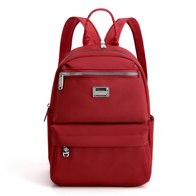 Naiste igapäevane esitasku ja tekstiilist lukuga seljakott