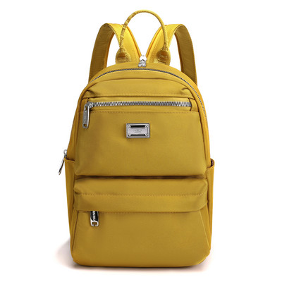 Naiste igapäevane esitasku ja tekstiilist lukuga seljakott