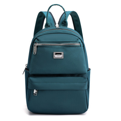 Naiste igapäevane esitasku ja tekstiilist lukuga seljakott