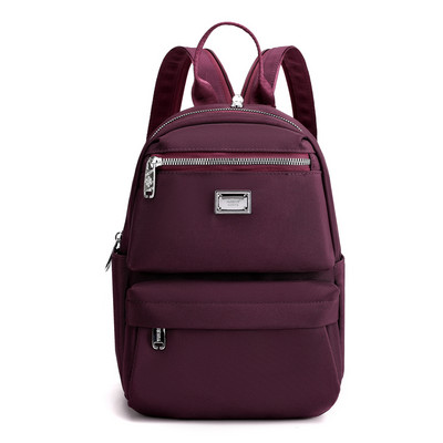 Naiste igapäevane esitasku ja tekstiilist lukuga seljakott