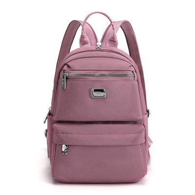 Naiste igapäevane esitasku ja tekstiilist lukuga seljakott