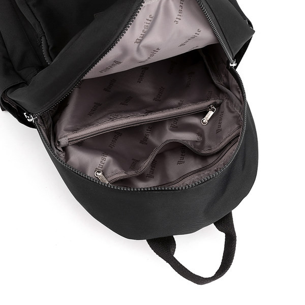 Naiste tekstiilist seljakott taskutega mitmes värvitoonis