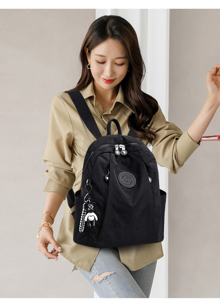 Naiste igapäevane tekstiilist tikandiga seljakott