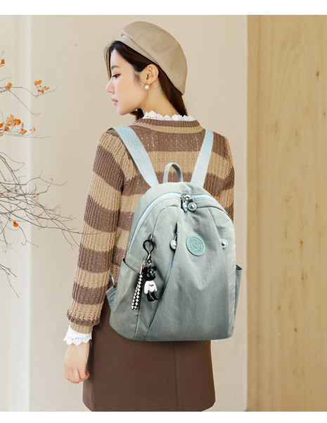 Naiste igapäevane tekstiilist tikandiga seljakott