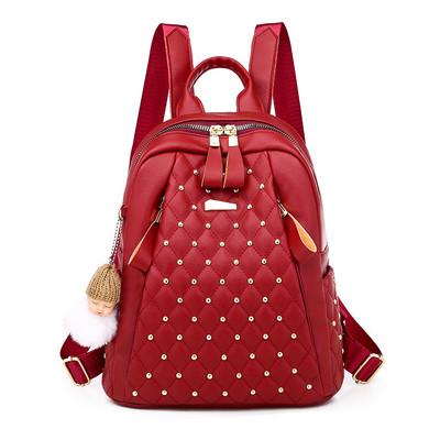 Naiste tepitud kunstnahast seljakott metallist kabedega