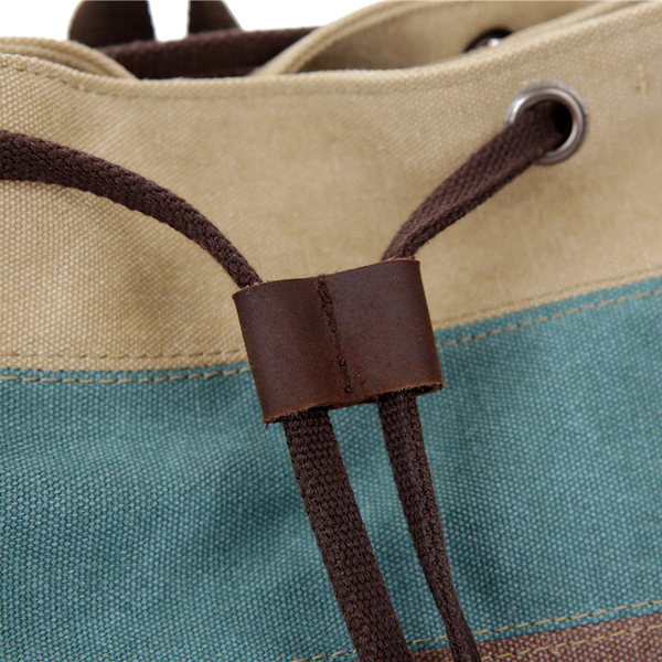 Triibuline naiste seljakott õlasangidega