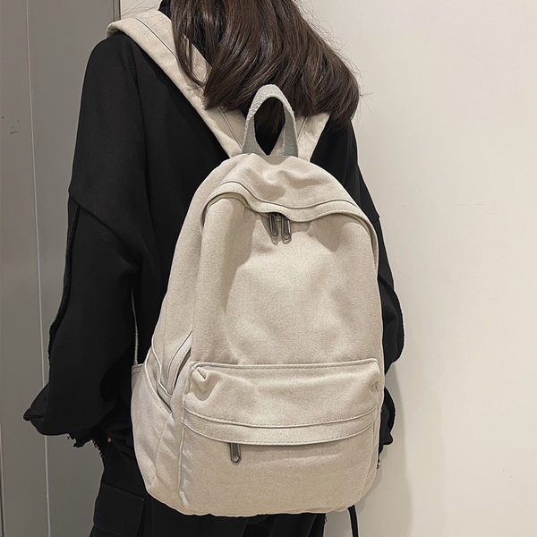 Naiste lõuendist seljakott laiade rihmade ja taskuga