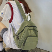 Väike tekstiilist seljakott mitme lahtriga