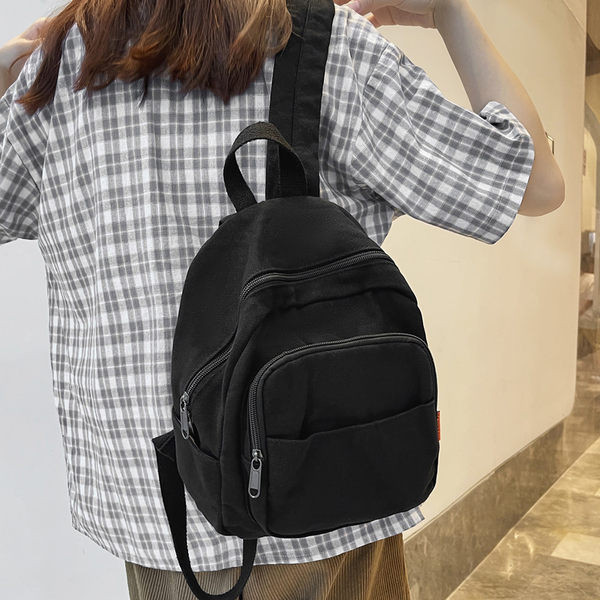 Väike tekstiilist seljakott mitme lahtriga