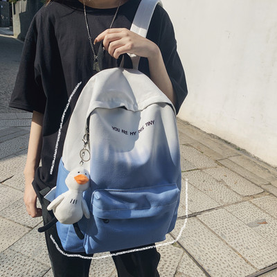 Naiste igapäevane tekstiilist seljakott kirjaga