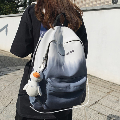 Naiste igapäevane tekstiilist seljakott kirjaga