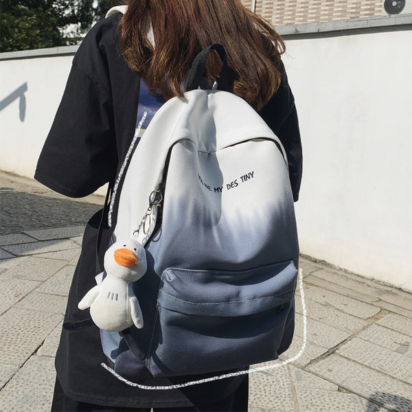 Naiste igapäevane tekstiilist seljakott kirjaga