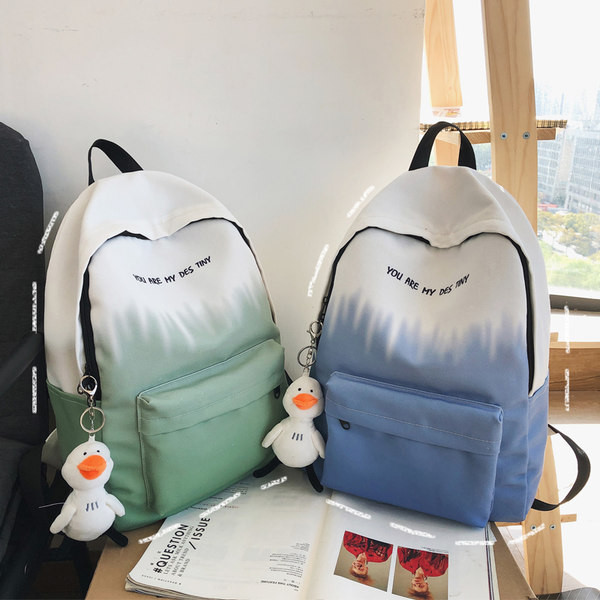 Naiste igapäevane tekstiilist seljakott kirjaga