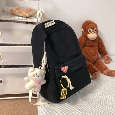 Suur tekstiilist seljakott pehme võtmehoidjaga