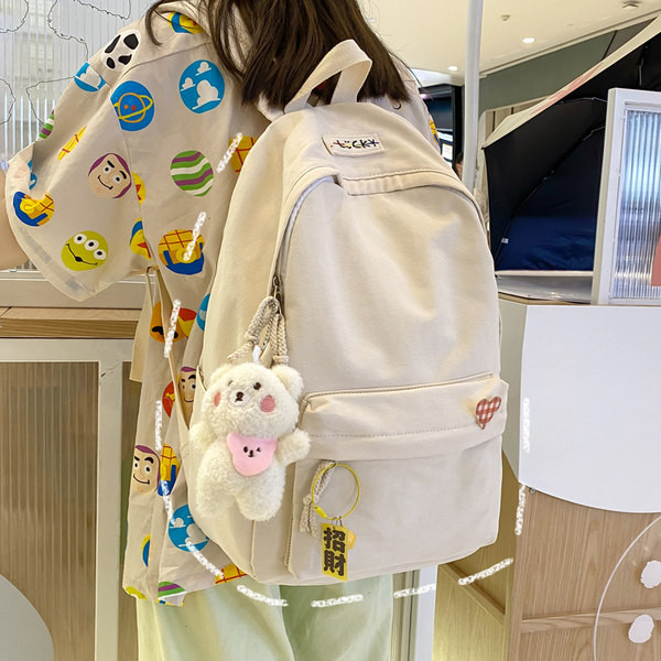 Suur tekstiilist seljakott pehme võtmehoidjaga