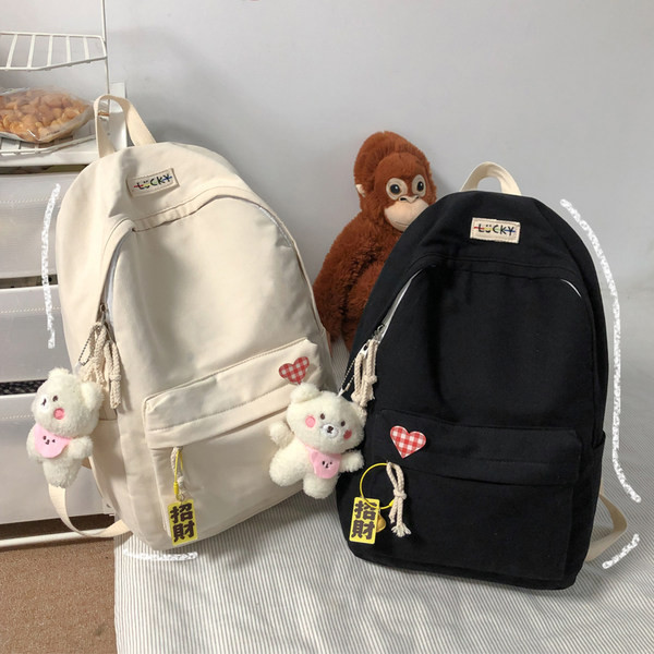 Suur tekstiilist seljakott pehme võtmehoidjaga