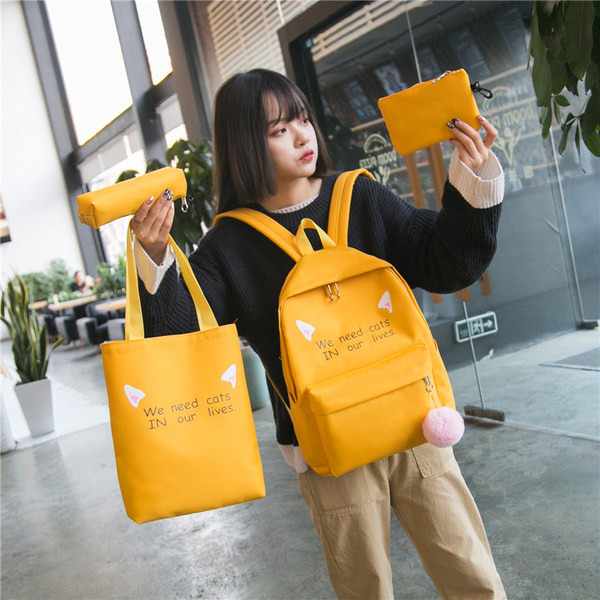 Naiste seljakott neljas värvitoonis kirjadega