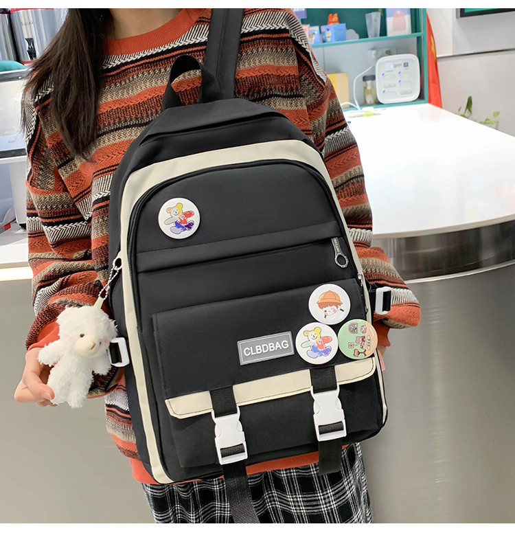 Moodne naiste seljakott luku ja tekstiilist lukuga