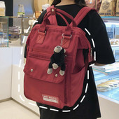 Ruudukujuline multifunktsionaalne tekstiilist seljakott ja võtmehoidja