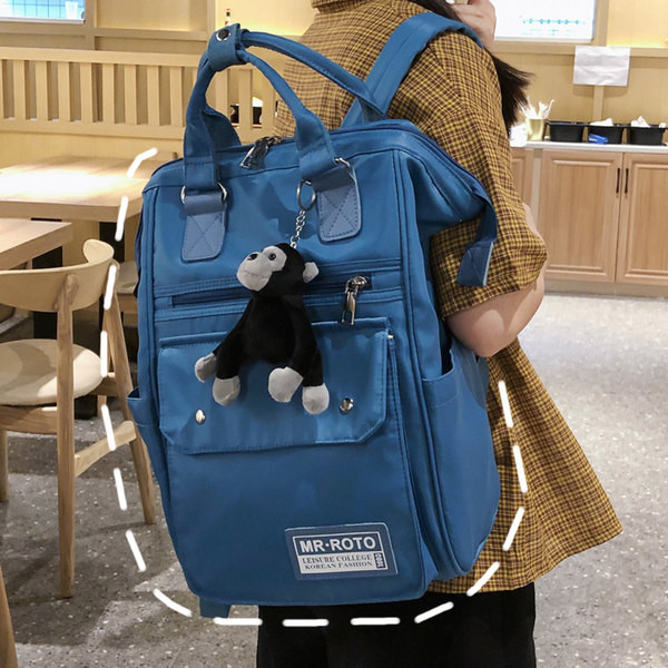 Ruudukujuline multifunktsionaalne tekstiilist seljakott ja võtmehoidja