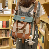 Naiste tekstiilist tikandiga seljakott - mitut värvi