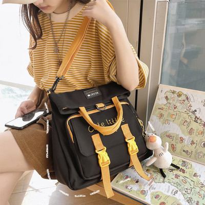 Naiste tekstiilist tikandiga seljakott - mitut värvi