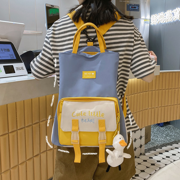 Naiste tekstiilist tikandiga seljakott - mitut värvi