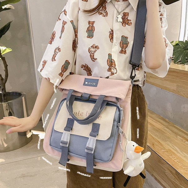 Naiste tekstiilist tikandiga seljakott - mitut värvi