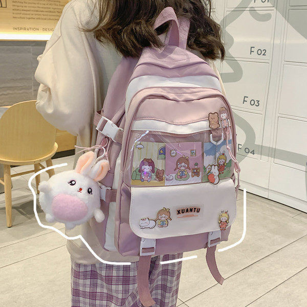 Moodne kooli seljakott luku ja tekstiilist pandlaga