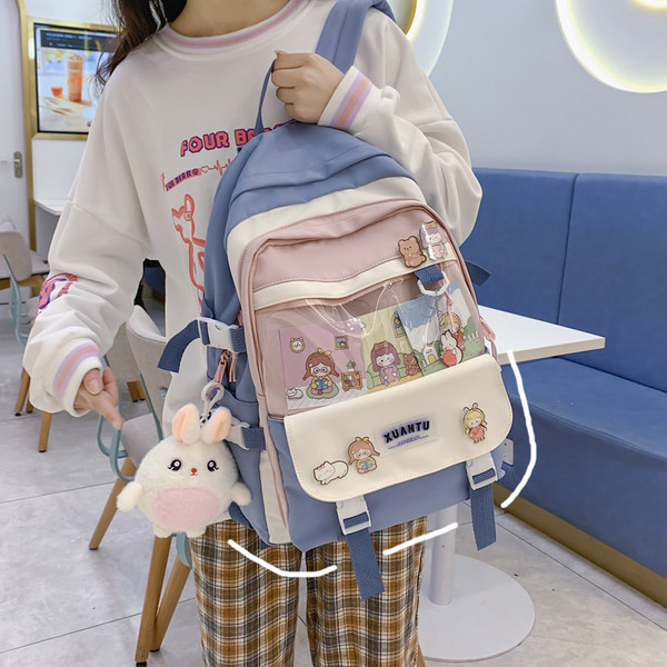 Moodne kooli seljakott luku ja tekstiilist pandlaga