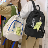 Naiste tekstiilist seljakott kirja ja aplikatsiooniga