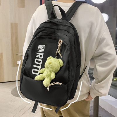 Naiste tekstiilist seljakott kirja ja aplikatsiooniga