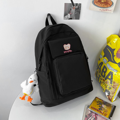 Esitasku ja laiade rihmadega tekstiilist seljakott naistele