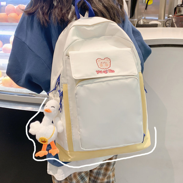 Esitasku ja laiade rihmadega tekstiilist seljakott naistele