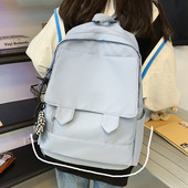 Lihtne tekstiilist naiste kooliseljakott