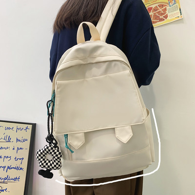 Lihtne tekstiilist naiste kooliseljakott