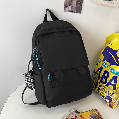 Lihtne tekstiilist naiste kooliseljakott