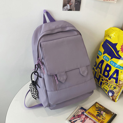 Lihtne tekstiilist naiste kooliseljakott