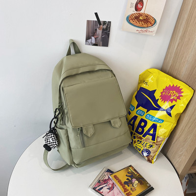 Lihtne tekstiilist naiste kooliseljakott