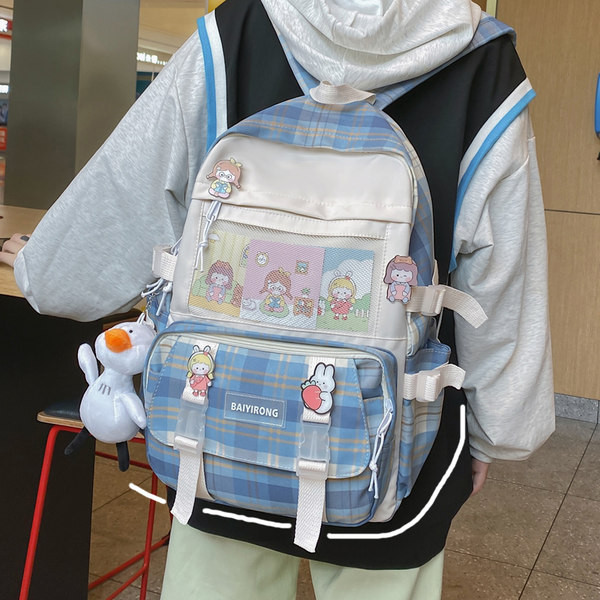 Tekstiilist värvilise mustriga seljakott ja võtmehoidja