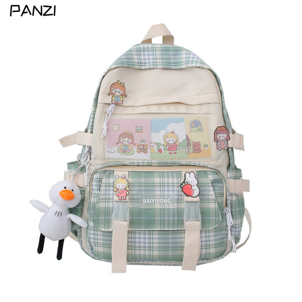 Tekstiilist värvilise mustriga seljakott ja võtmehoidja