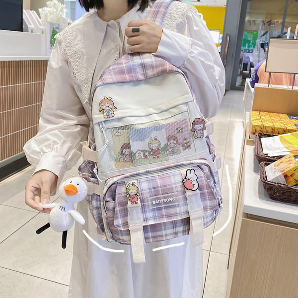 Tekstiilist värvilise mustriga seljakott ja võtmehoidja